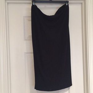 Long, fitted black skirt